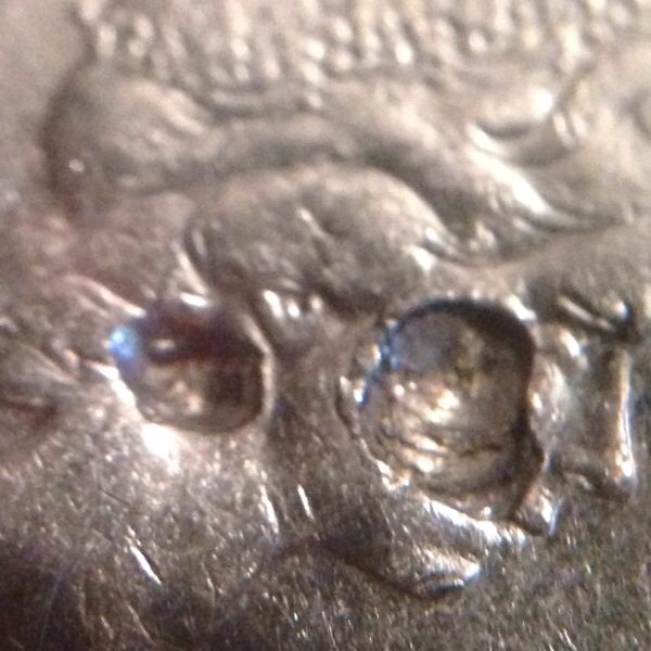 1968-Five-Cent-Big-Holes-On-It-?