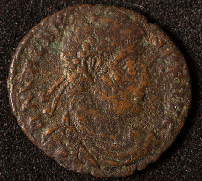 A-Small-Well-Worn-Copper-Coin-Of-Unknown-Origin
