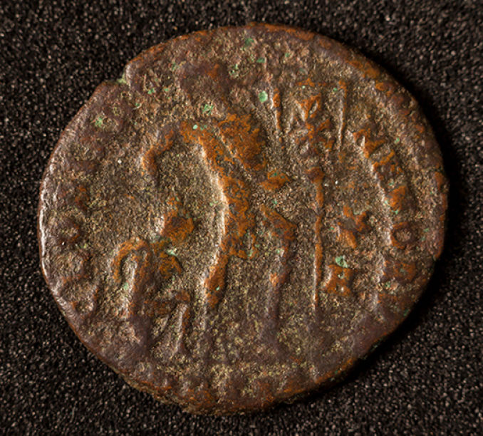 A-Small-Well-Worn-Copper-Coin-Of-Unknown-Origin