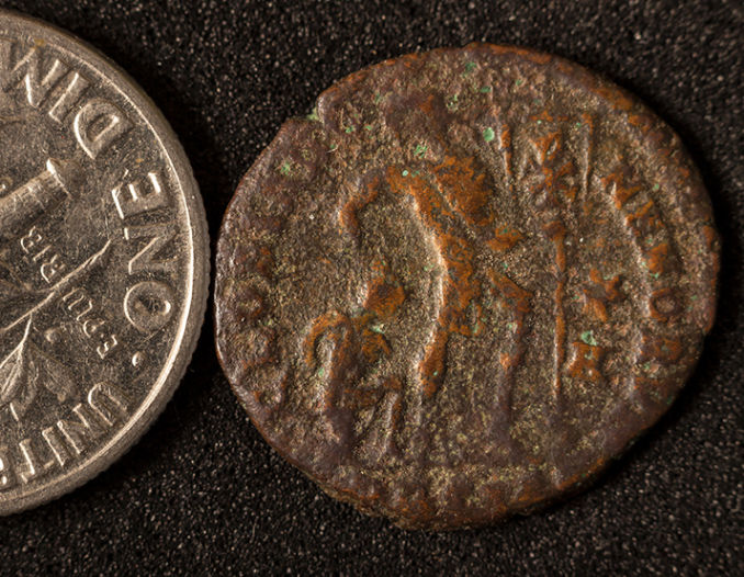 A-Small-Well-Worn-Copper-Coin-Of-Unknown-Origin