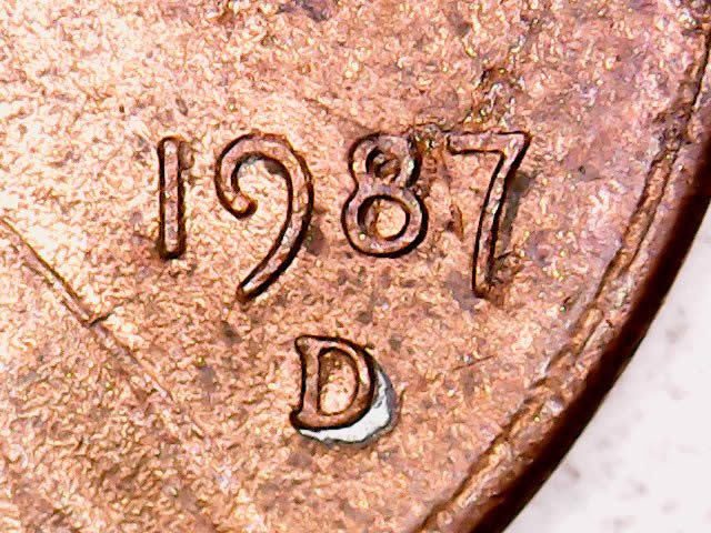 1987-D-Silver-Coloring-Above-Lettering-And-Also-The-D-MM