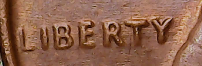 Funny-Looking-1973-D--LC---Winged-D---Liberty---From-Skinny-To-Large-Letters