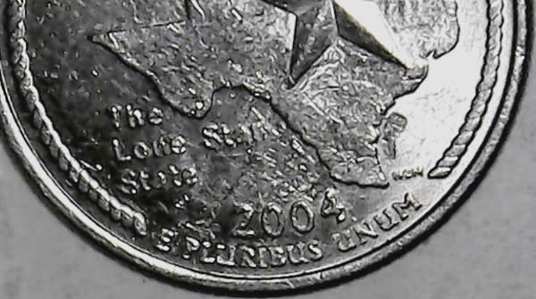 TX-Quarter-Struck-Through---Texas-Has-A-New-Island