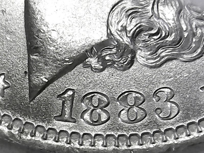 1883-O-Morgan-Dollar---Clashes?