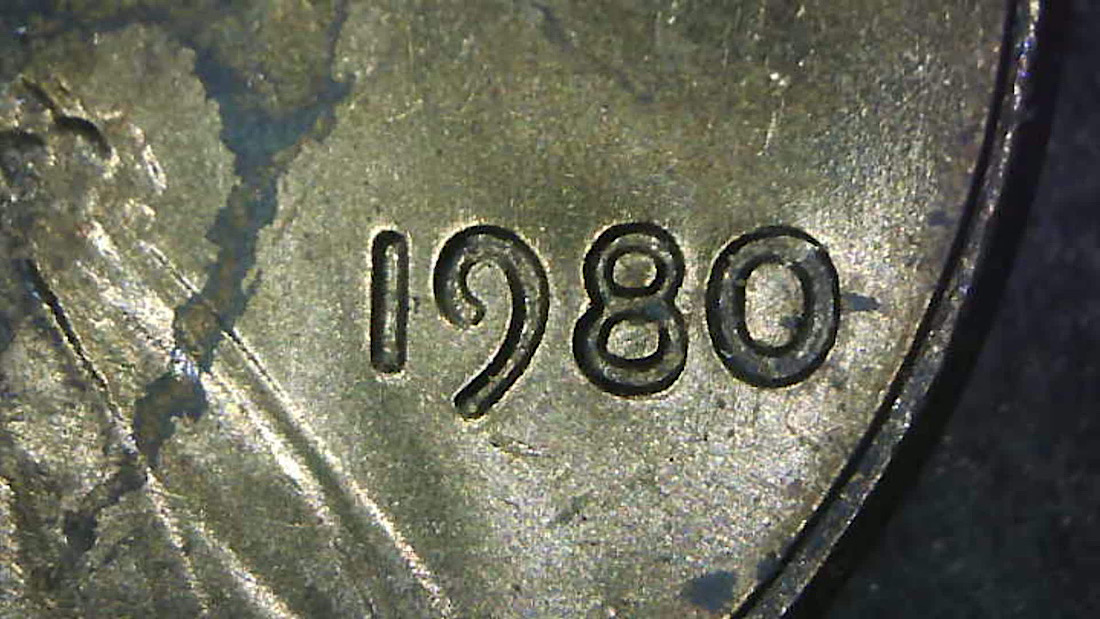 1980-P-1c-Struck-Through-With-Dropped-Letters?