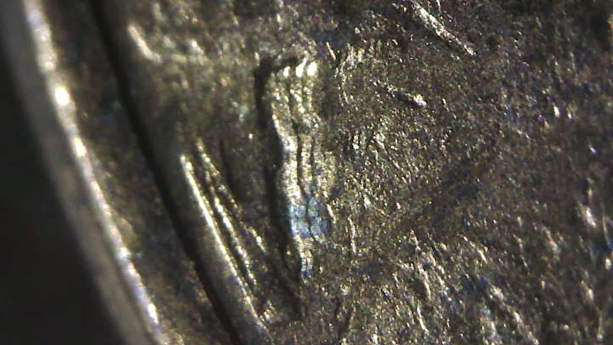 1980-P-1c-Struck-Through-With-Dropped-Letters?