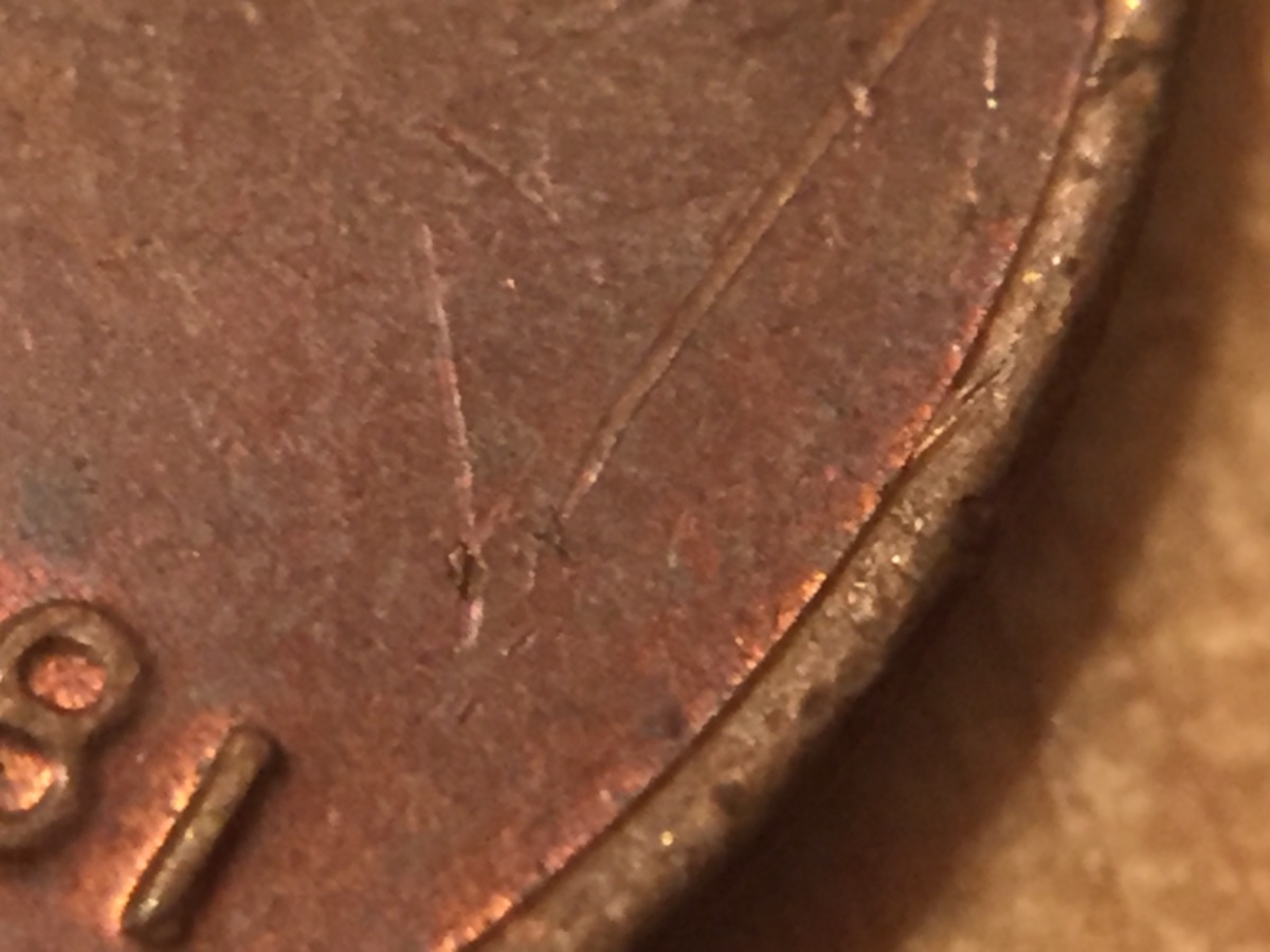 1981-LMC--Struck-Through-Or-A-Scratch?