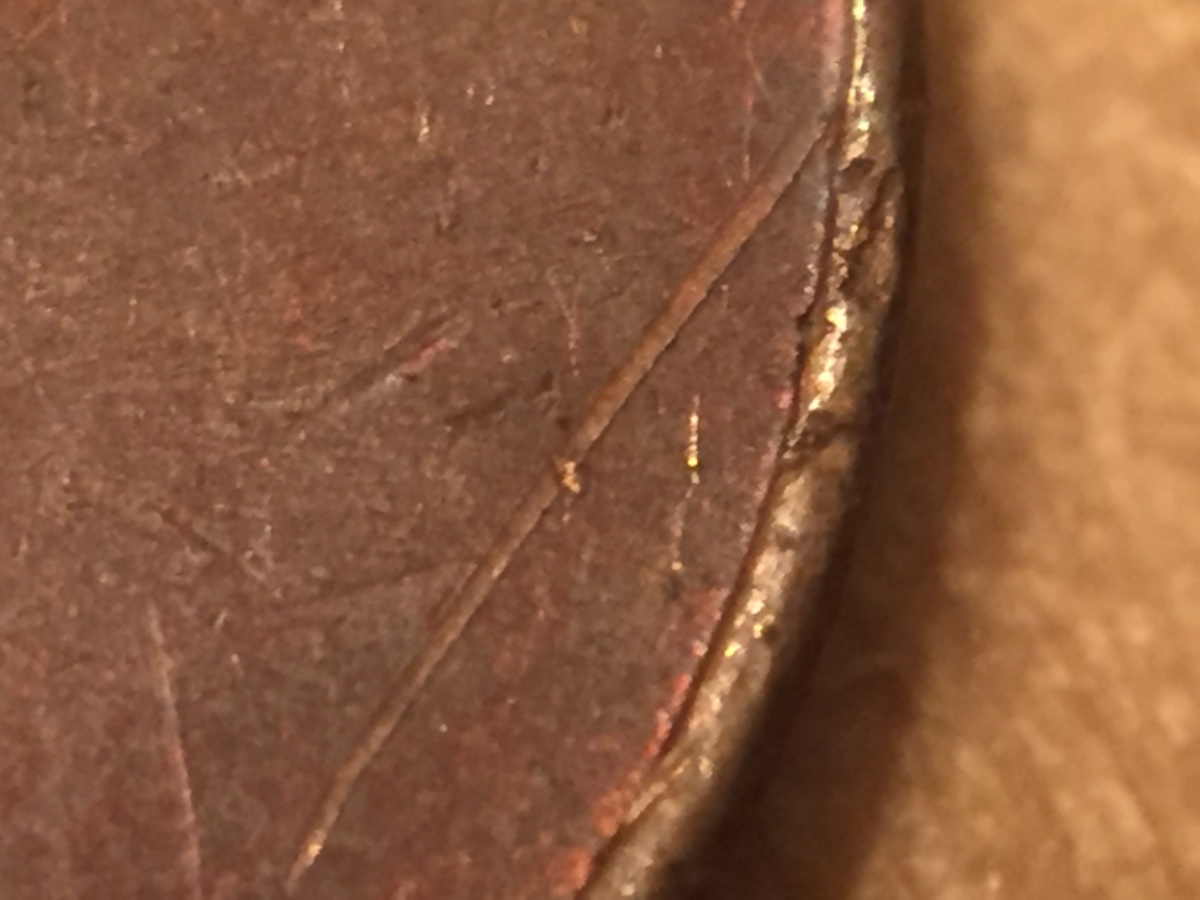 1981-LMC--Struck-Through-Or-A-Scratch?