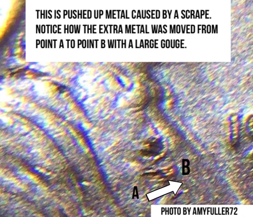 Not-Sure,-Could-Be-Just-Damage,-But-I-See-A-2-On-Lincoln's-Chest