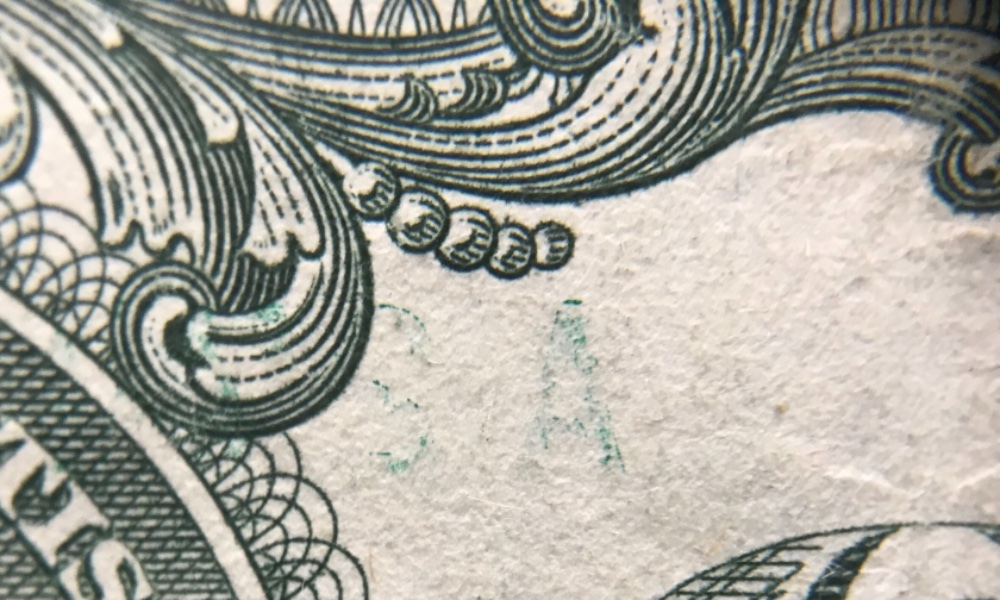 2009-$1-Error-Note---Parts-Of-The-Serial-#-Show-Through-Strongly-On-Reverse