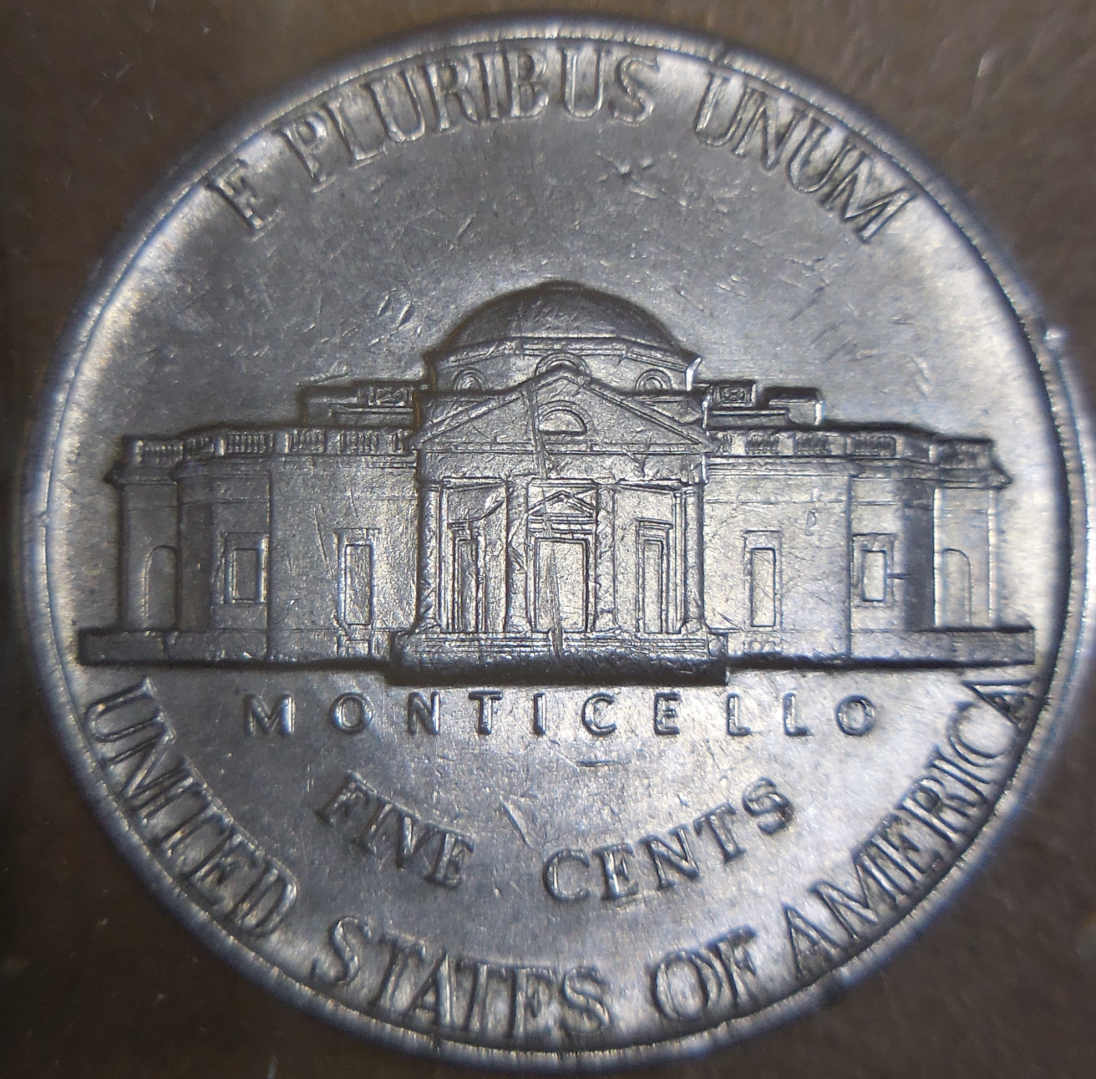 What's-Up-With-The-Rim-On-This-1977-Nickel?