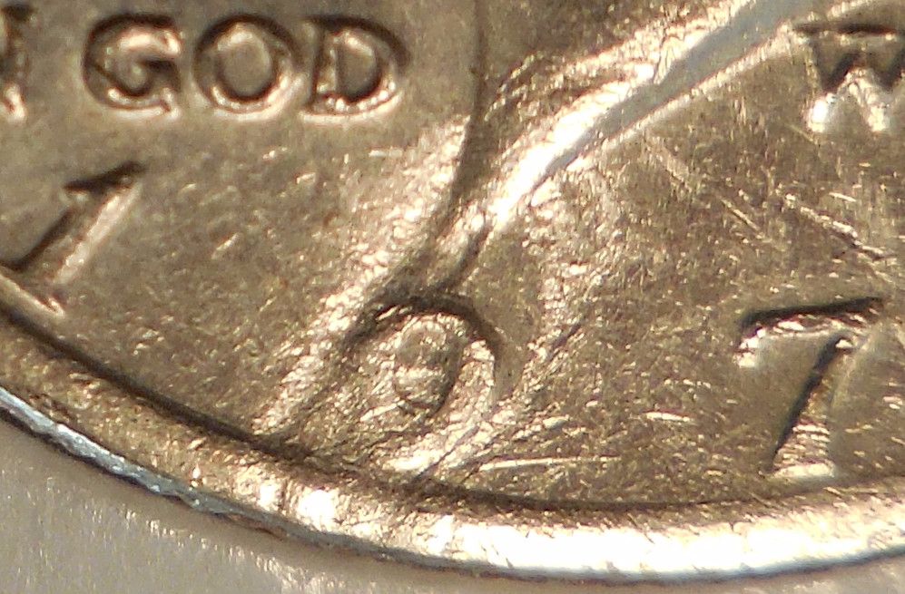 1971-P-Kennedy-Half-Struck-Through-Something?