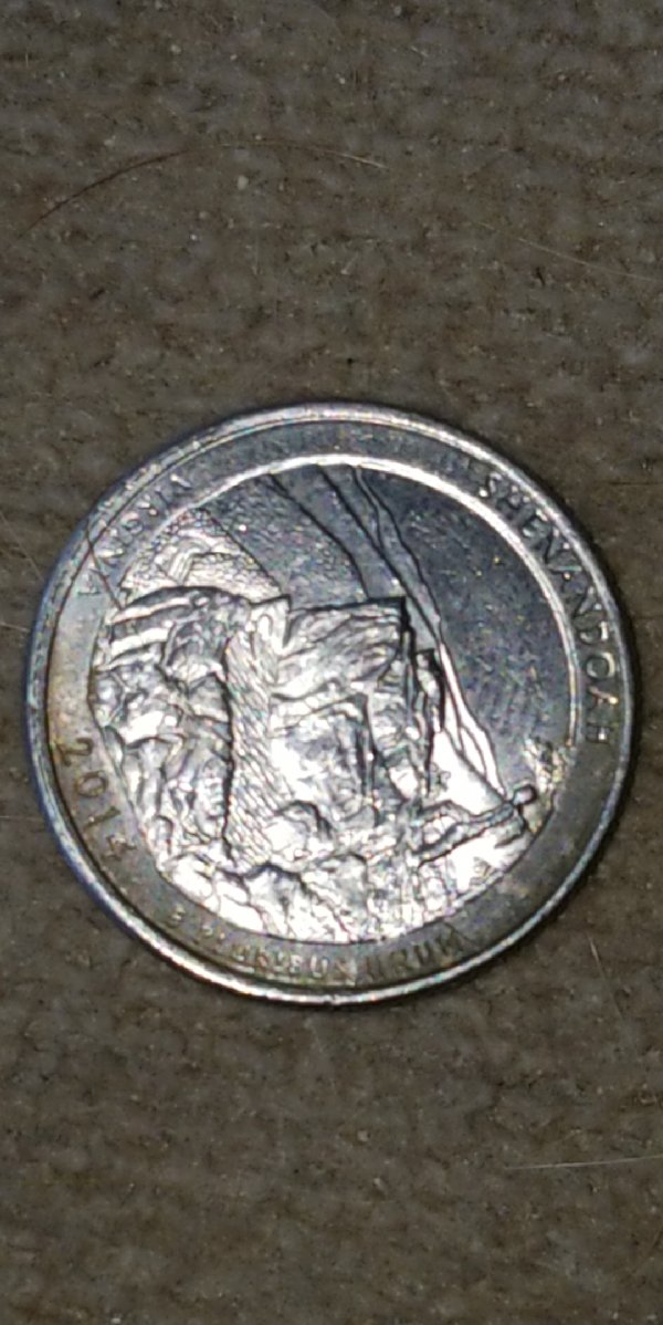 This-Looks-Like-A-Mint-Die-Error-2014-D-Quarter