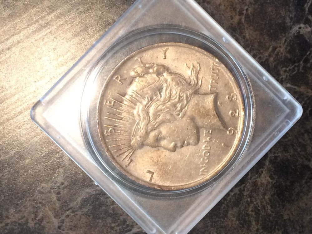 Help-With-Type/Value-On-A-1928-Peace-Dollar?
