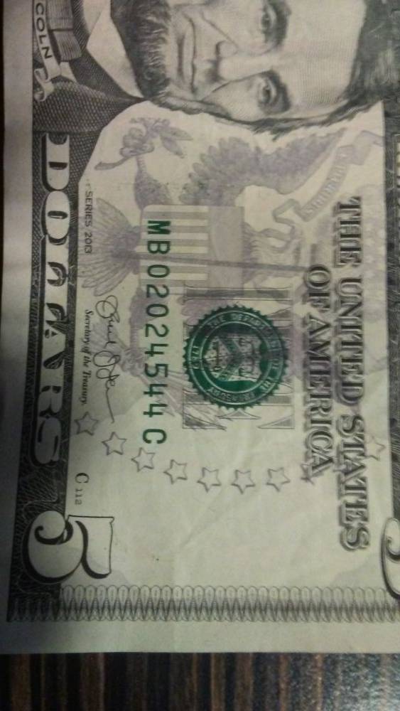 $5-Bill-With-A-Extra-Ink-Line