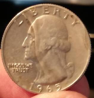 1965-Quarter-Strange-Line-In-The-Metal