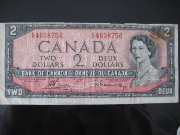 1954-Off-Centre-Cut-$1-Bill?
