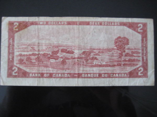 1954-Off-Centre-Cut-$1-Bill?