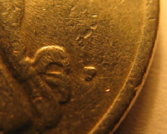 Filled-P-On-1980-Quarter?