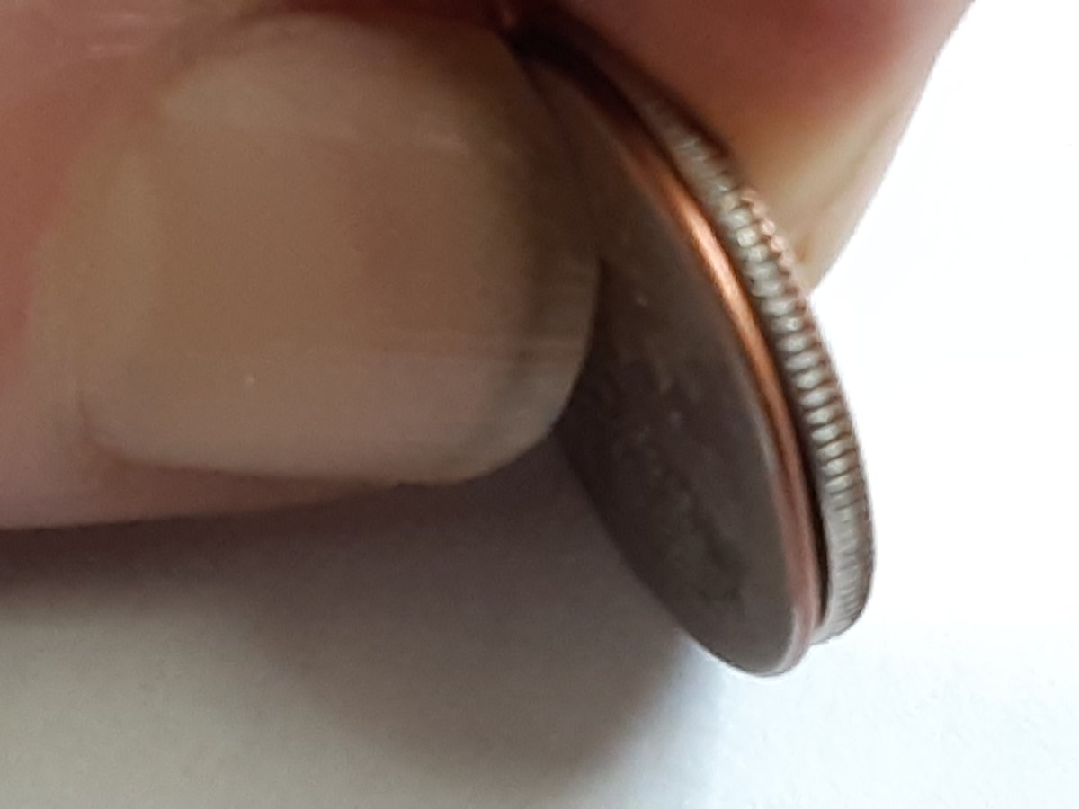 Very-Odd-Dime.-Not-Sure-But-Maybe-1997-D-Planchet