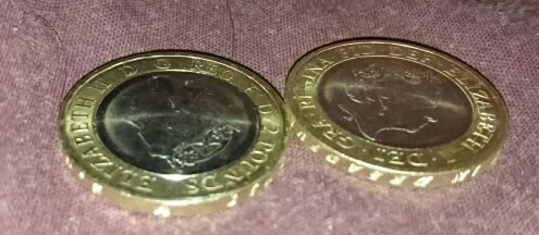 New-�2-Coin-Upside-Down-Writing