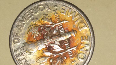 Can-Anyone-Tell-Me-What-The-Dark-Parts-Of-These-Coins-Are?