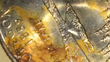 Can-Anyone-Tell-Me-What-The-Dark-Parts-Of-These-Coins-Are?