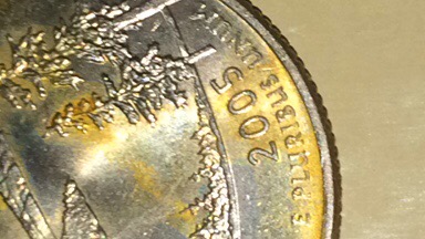 Can-Anyone-Tell-Me-What-The-Dark-Parts-Of-These-Coins-Are?
