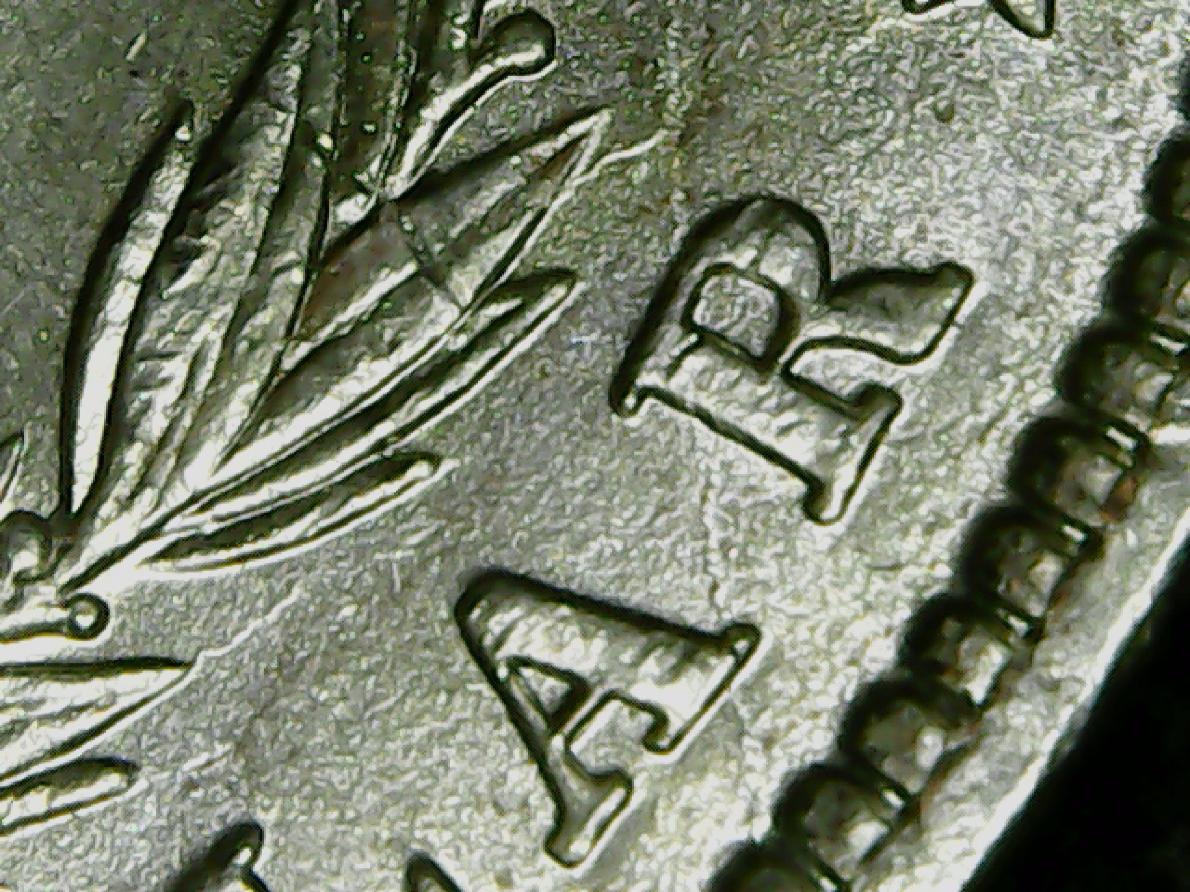 1982-O-Morgan-Dollar-Help-Please.-The-Reverse-Has-More-Of-Whatever-This-Is.