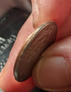 Need-Help-Identifying-If-This-1985-Coin-Is-Damaged-Or-If-It-Is-A-Mint-Error.