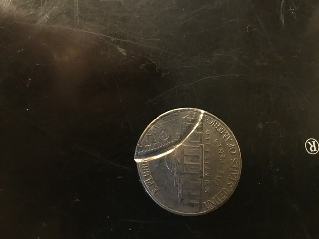 How-On-Earth-Could-This-Happen.-Legs-On-The-Reverse-Of-My-Nickel-Is-The-Imprint-Of-A-Dollar?-Type-Of
