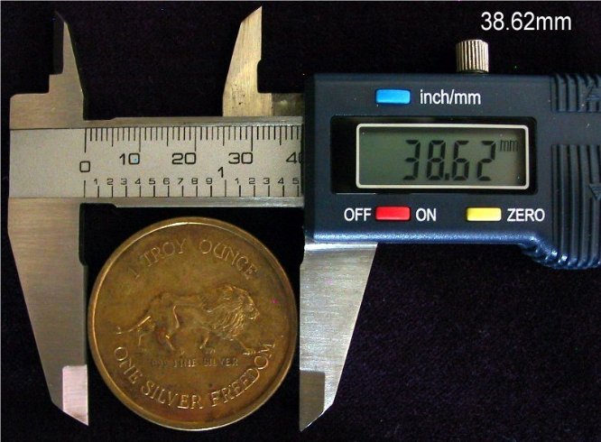 Silver-Round-In-Brass-?