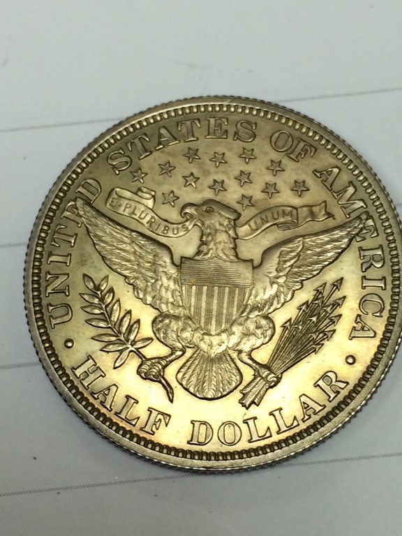 Strange-Gold-Tone-On-This-1894-Half-Dollar