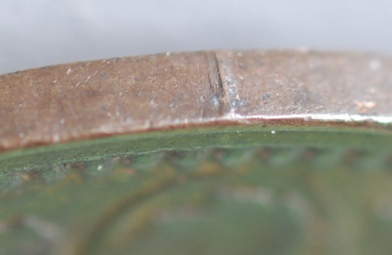 Collar-Crack-In-A-Victorian-Cent....
