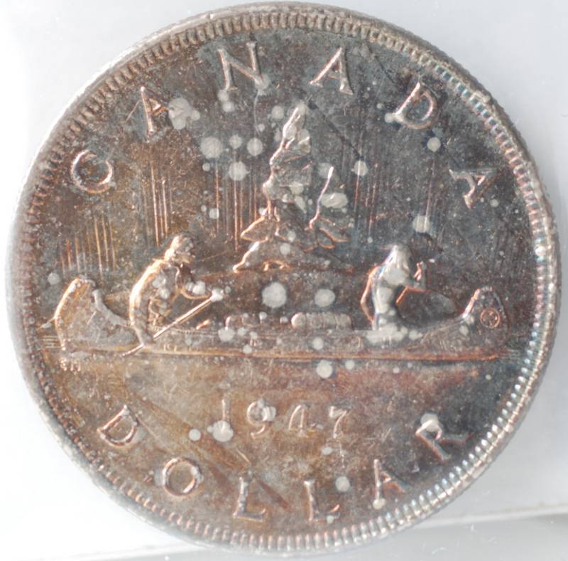 1947-Blunt-Silver-Dollar-With-A-7-Over-7