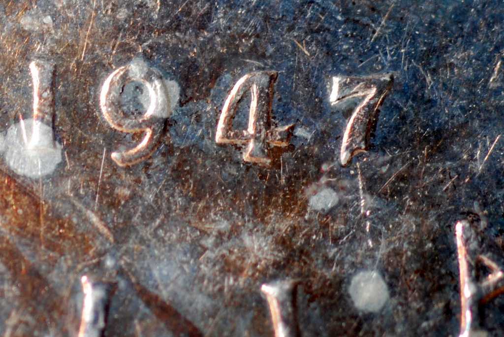 1947-Blunt-Silver-Dollar-With-A-7-Over-7