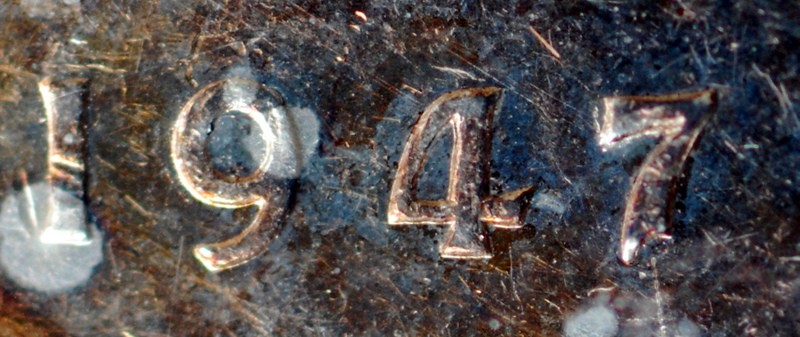 1947-Blunt-Silver-Dollar-With-A-7-Over-7