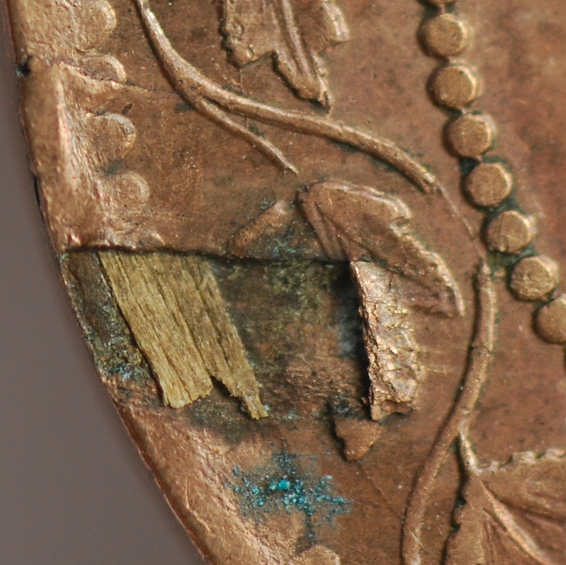 1859-Provincial-Cent-With-Retained-Wood-Or-Fiber-Fragment?