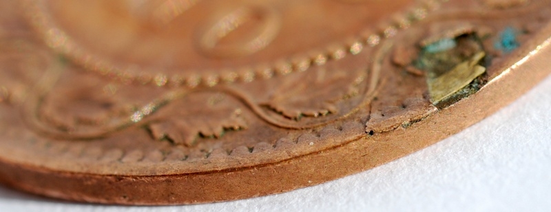 1859-Provincial-Cent-With-Retained-Wood-Or-Fiber-Fragment?