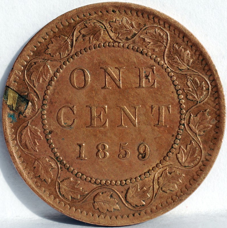 1859-Provincial-Cent-With-Retained-Wood-Or-Fiber-Fragment?