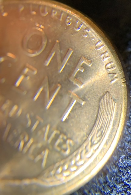 1958-Wheat-Penny-With-Part-Of-Lettering-Stamped-On-Rim/Edge?