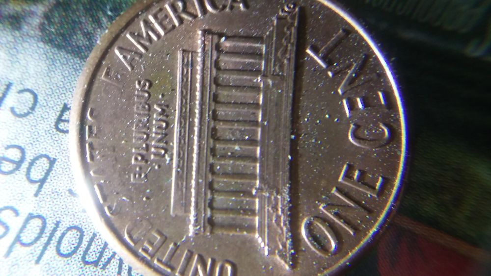 Mint-Error?-1991-D-Penny-And-1987-D
