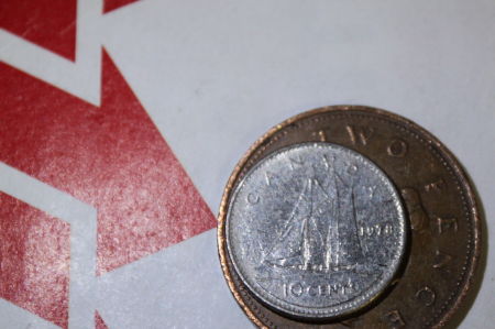 British-5-Pence-In-Canadian-Dime-Roll