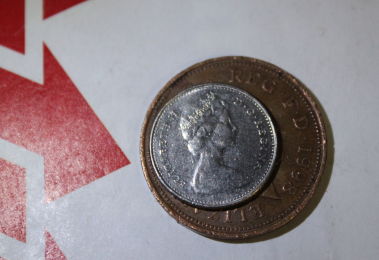 British-5-Pence-In-Canadian-Dime-Roll