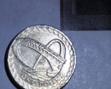 Fake-£1