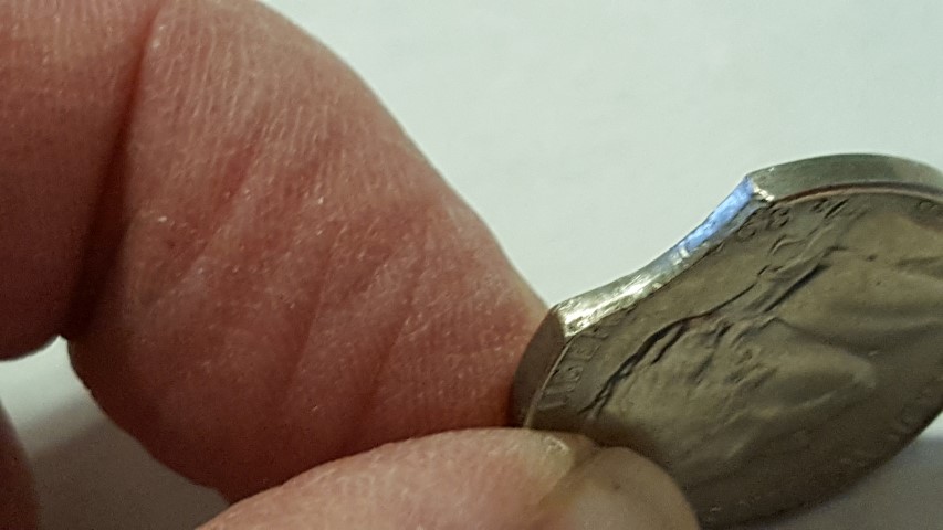 Are-The-Clips-In-This-Nickel-Mint-Damage-Or-PMD?