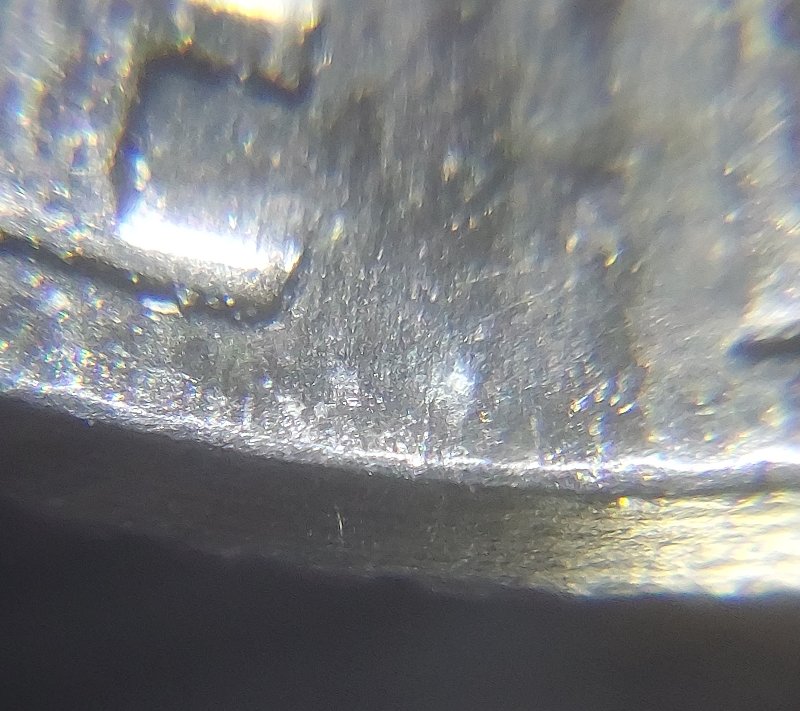 1993--D-Dime-What-Is-This-Slope-On-The-Collar-Of-Coin?