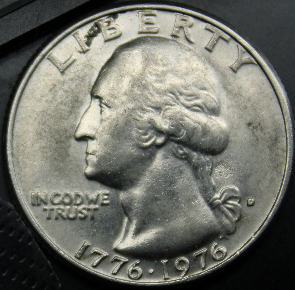 1976-D-Quarter-Struck-Though-Grease/Debris