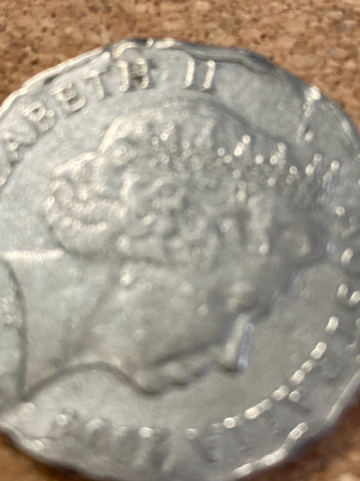 Odd-Melted-Coin-From-2014.-Can-Anyone-Tell-Me-If-It-Has-Any-Worth?