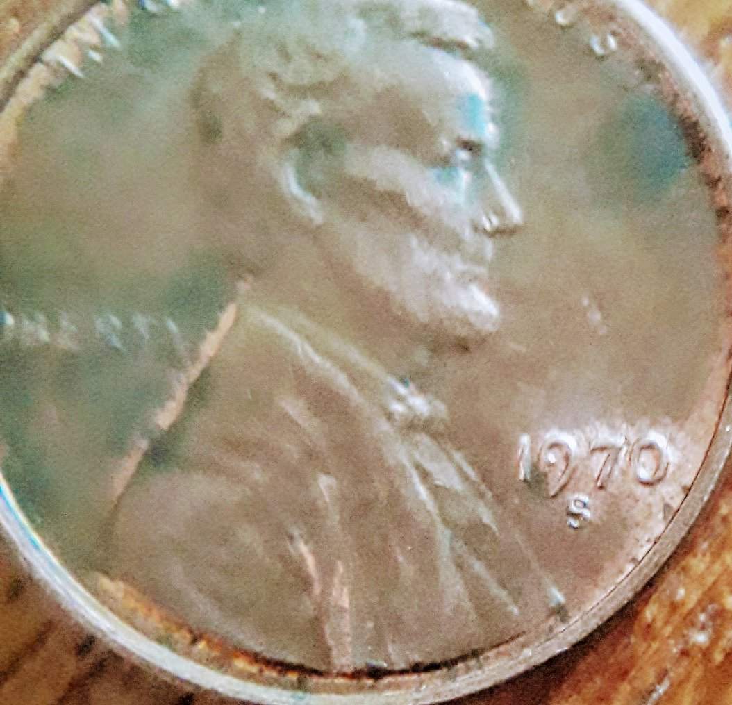 This-Penny-Was-In-The-Jar-Along-With-Many-Other-World-Coins-.